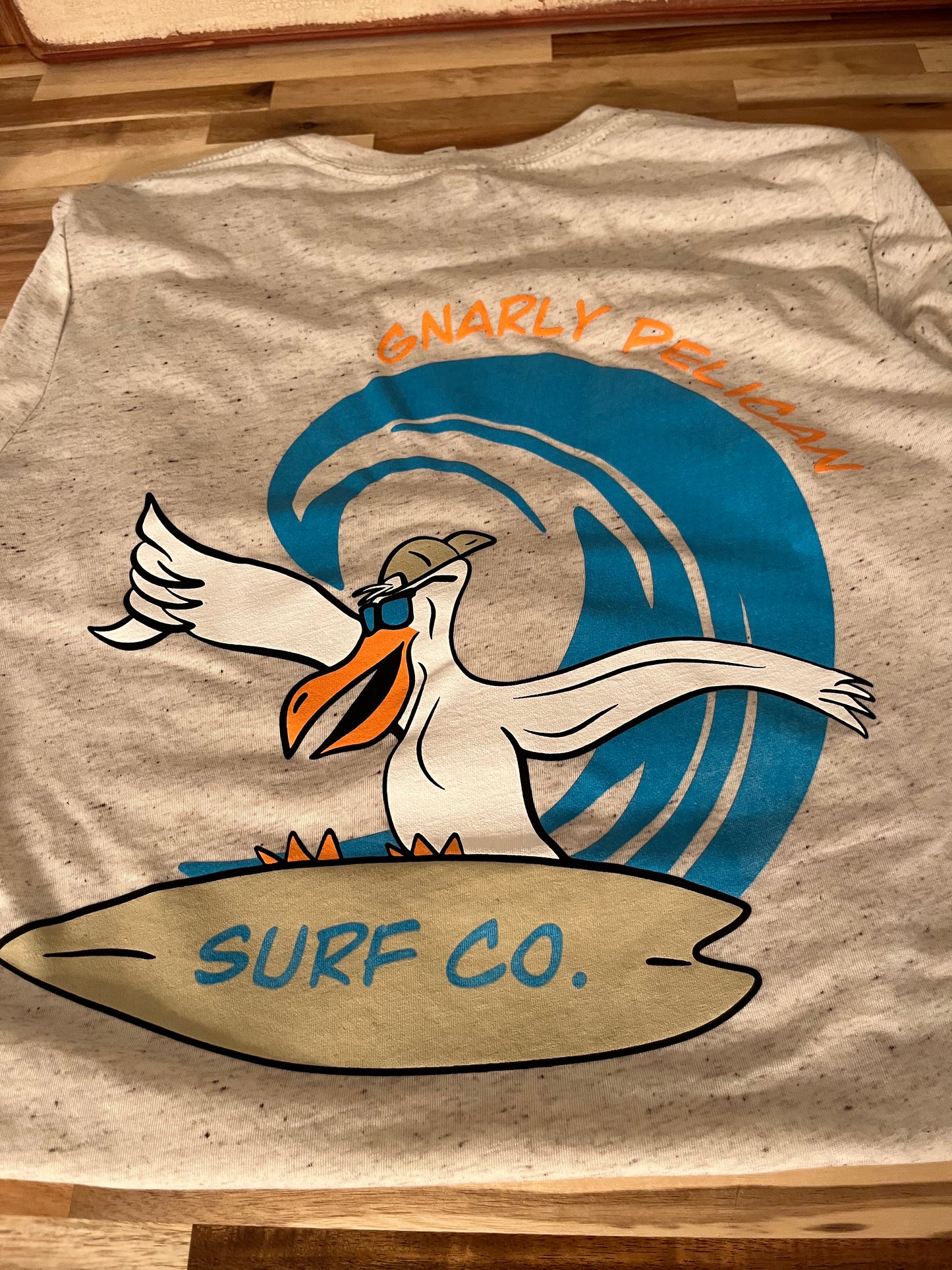 Gnarly Pelican Surfing Unisex Tee