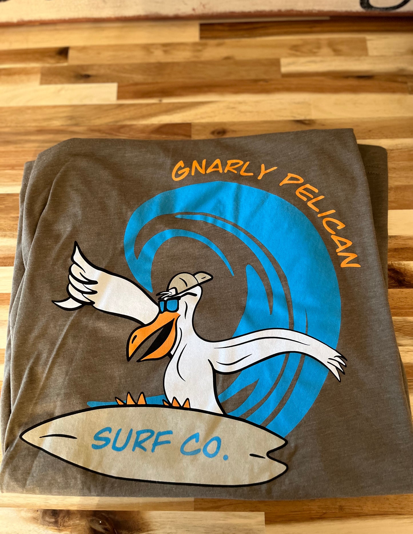 Gnarly Pelican Surfing Unisex Tee